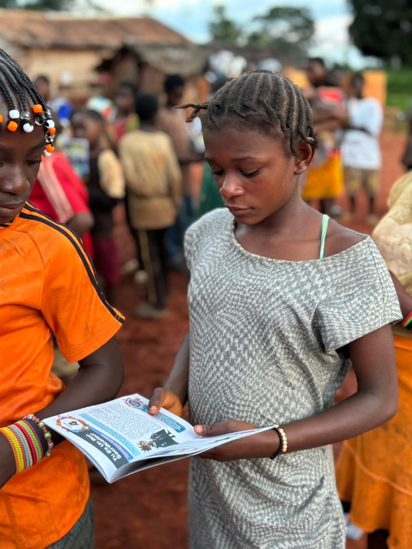 A teenager reading during a previous Rhapsody outreach in Cameroon